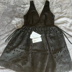 Sandro Beautiful Black Mini Dress! Size 1 but fits full Size S. Like New!